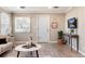 Bright and airy living room with modern decor, hardwood floors, and large windows at 377 Stuart St, Denver, CO 80219