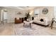 Well-decorated living room, featuring an area rug, comfortable seating, and natural lighting at 377 Stuart St, Denver, CO 80219
