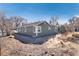 Rear exterior view of the home showcasing neutral siding and simple landscaping at 377 Stuart St, Denver, CO 80219