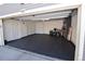Spacious garage with epoxy floor and interior doors at 17747 E 54Th Ave, Denver, CO 80249