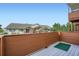 Relaxing balcony with wood railings offering a view of the complex at 4135 E 119Th Pl # A, Thornton, CO 80233