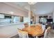 Bright dining area connecting to kitchen, offering a modern open-concept layout at 4135 E 119Th Pl # A, Thornton, CO 80233