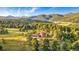 Beautiful home nestled in the mountains with expansive views at 22196 Boar Head Rd, Indian Hills, CO 80454