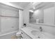 Clean basement bathroom with a tub, shower, and vanity at 22196 Boar Head Rd, Indian Hills, CO 80454