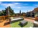 Relaxing deck with seating area, offering stunning mountain views at 22196 Boar Head Rd, Indian Hills, CO 80454