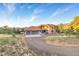 Spacious home with a large driveway and mountain views at 22196 Boar Head Rd, Indian Hills, CO 80454