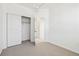 Bedroom featuring closet and neutral carpet at 458 Millwall Cir, Castle Pines, CO 80108