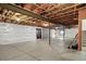 Unfinished basement, offering potential for customization and expansion at 51 W 6Th Pl, Byers, CO 80103