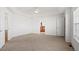 Large bedroom featuring a closet and an attached bathroom at 51 W 6Th Pl, Byers, CO 80103