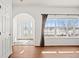 Bright and spacious entryway with hardwood floors and a view to the backyard at 51 W 6Th Pl, Byers, CO 80103