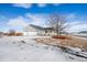 Well-maintained house exterior with large garage and landscaping at 51 W 6Th Pl, Byers, CO 80103