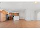 Bright open kitchen with stainless appliances and wood cabinets at 51 W 6Th Pl, Byers, CO 80103