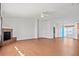 Open living room space with fireplace and lots of natural light at 51 W 6Th Pl, Byers, CO 80103
