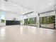 Massive garage space features a basketball hoop and large glass doors for outdoor access at 34089 Woodland Dr, Evergreen, CO 80439