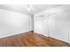 Empty bedroom featuring wood floors, and closet space at 5167 S Pearl St, Littleton, CO 80121