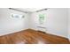 Empty bedroom features hard wood floors, and abundant natural light at 5167 S Pearl St, Littleton, CO 80121