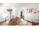 Bright living room featuring wood floors, modern decor, and abundant natural light at 5167 S Pearl St, Littleton, CO 80121