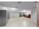 Spacious basement with concrete flooring and white walls at 14300 Waterside Ln # E3, Broomfield, CO 80023