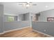 Open loft area with hardwood floors and natural light at 14300 Waterside Ln # E3, Broomfield, CO 80023