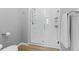 Glass enclosed tiled shower with shelving at 14300 Waterside Ln # E3, Broomfield, CO 80023