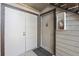 Exterior entryway with two doors and a fire extinguisher for safety at 12037 E Harvard Ave # 104, Aurora, CO 80014