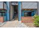 Apartment building entrance with a staircase and outdoor area at 12037 E Harvard Ave # 104, Aurora, CO 80014