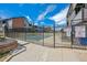 Gated community pool area with clear blue skies in a residential area at 12037 E Harvard Ave # 104, Aurora, CO 80014