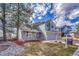 Charming two-story home with well-maintained lawn and two-car garage at 10941 Parker Vista Rd, Parker, CO 80138