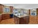 Gourmet kitchen with granite island, stainless steel appliances, and ample cabinet space at 10941 Parker Vista Rd, Parker, CO 80138