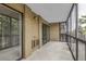 Balcony area enclosed with windows and door to indoor living area at 14152 E Linvale Pl # 408, Aurora, CO 80014