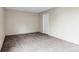 Spacious bedroom with neutral walls and neutral carpeting at 14152 E Linvale Pl # 408, Aurora, CO 80014
