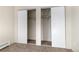 Large closet with open sliding doors and carpeting at 14152 E Linvale Pl # 408, Aurora, CO 80014