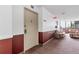Common hallway area with wall decor and seating, adding to the building's welcoming feel at 14152 E Linvale Pl # 408, Aurora, CO 80014