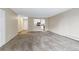 Living room with large area for seating, and bar access to the kitchen at 14152 E Linvale Pl # 408, Aurora, CO 80014