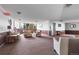 Bright lobby with seating arrangements and large windows, offering a relaxing atmosphere at 14152 E Linvale Pl # 408, Aurora, CO 80014