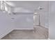 Finished basement with new carpeting and modern paint at 4654 Bryant St, Denver, CO 80211