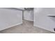 Spacious finished basement with new carpeting and modern paint at 4654 Bryant St, Denver, CO 80211
