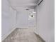 Finished basement with new carpeting, storage and a painted white finish at 4654 Bryant St, Denver, CO 80211
