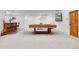 Finished basement with a pool table, bar area, and modern design at 740 W County Road 10E, Berthoud, CO 80513