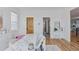 Bright bedroom featuring a marble table, wood accents, and stylish decor at 740 W County Road 10E, Berthoud, CO 80513