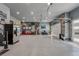 Spacious garage featuring epoxy floors and ample storage at 740 W County Road 10E, Berthoud, CO 80513
