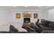 Cozy living room with a fireplace, large TV, and comfortable seating area at 740 W County Road 10E, Berthoud, CO 80513