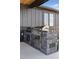 Outdoor kitchen with a built-in grill and countertop for outdoor cooking and entertaining at 740 W County Road 10E, Berthoud, CO 80513