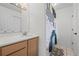 Bright bathroom with a single sink vanity and a decorative shower curtain at 1409 Quince Ave, Boulder, CO 80304