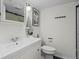 Modern bathroom featuring a sleek vanity, black accents, and a minimalist design at 1409 Quince Ave, Boulder, CO 80304