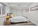 Cozy bedroom with a comfortable bed, natural light, and stylish decor at 1409 Quince Ave, Boulder, CO 80304