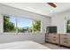 Bedroom offering tree views and a view of mountains from the windows at 1409 Quince Ave, Boulder, CO 80304