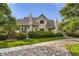 Charming two-story home with well-maintained landscaping and beautiful stone details at 2117 S Troy Way, Aurora, CO 80014