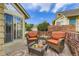Outdoor patio with seating and a view of the surrounding neighborhood at 2117 S Troy Way, Aurora, CO 80014