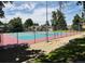 Enjoy a match on one of the community's tennis courts, surrounded by lush greenery and a secure fence at 2117 S Troy Way, Aurora, CO 80014